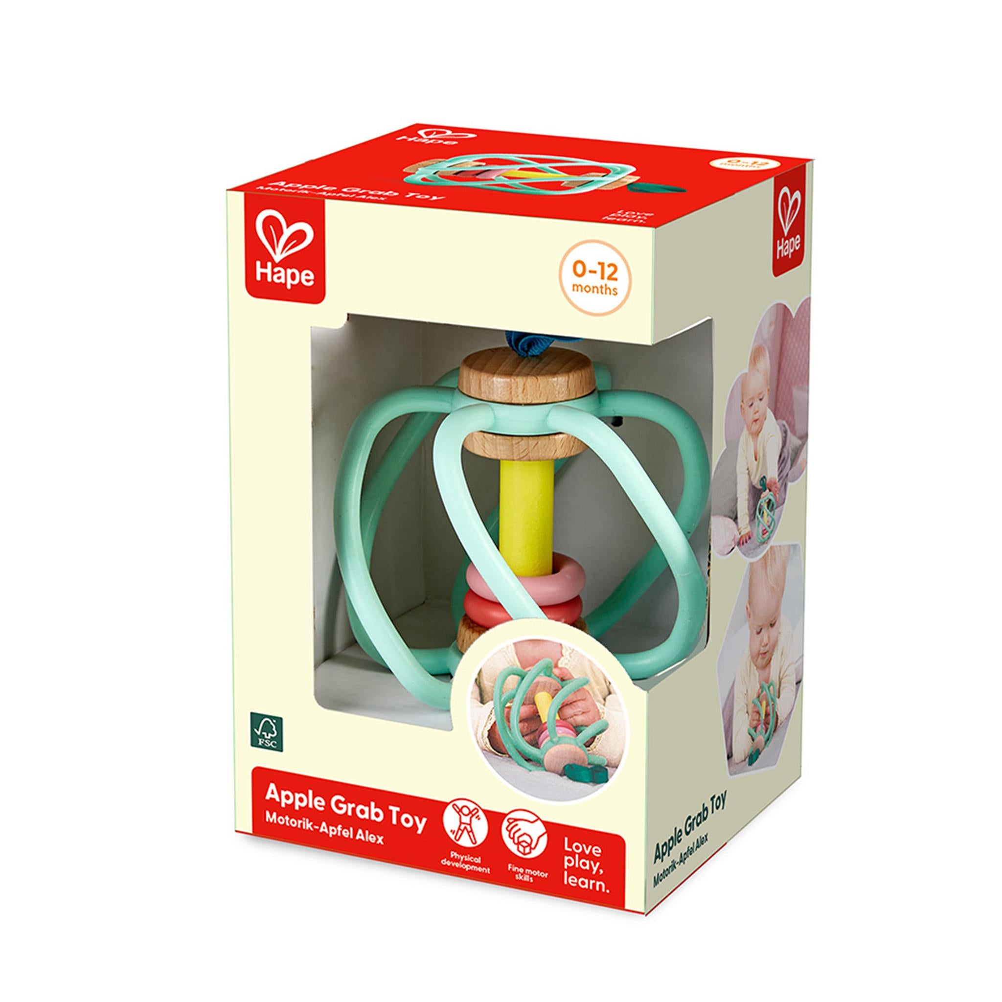 Packaged Hape Apple Grab Toy featuring a colorful baby toy with wooden rings and silicone teething elements, displayed in a box with product information.