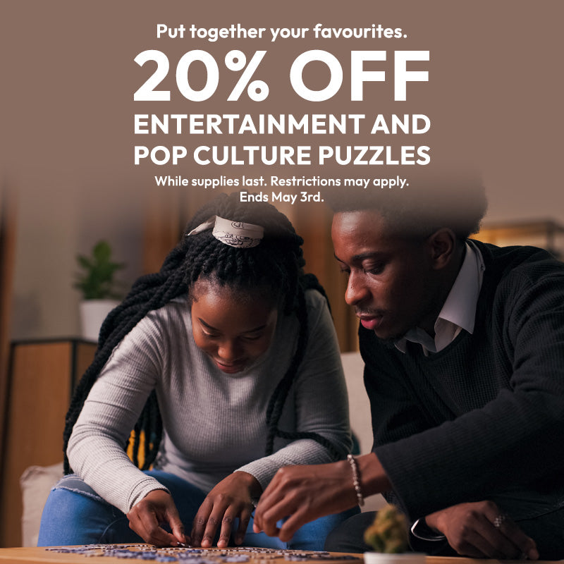 Two people working on a puzzle with promotional text overlay for entertainment and pop culture puzzles.