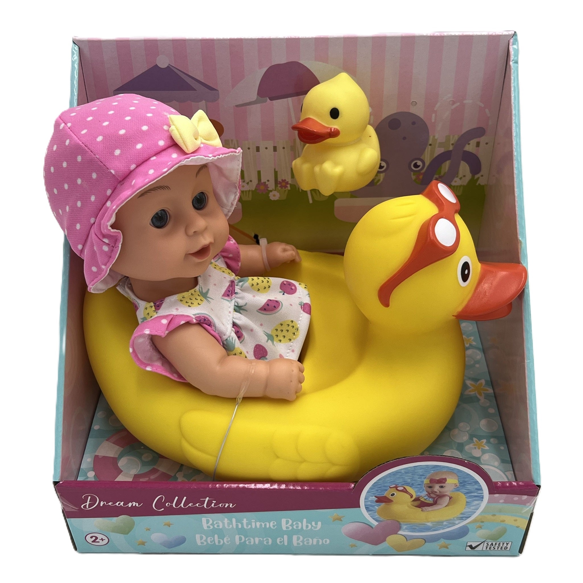 A baby doll in a pink hat and floral dress sitting in a yellow rubber duck, with a small yellow duck floatie in the background, all packaged in a box with 'Dream Collection' branding.