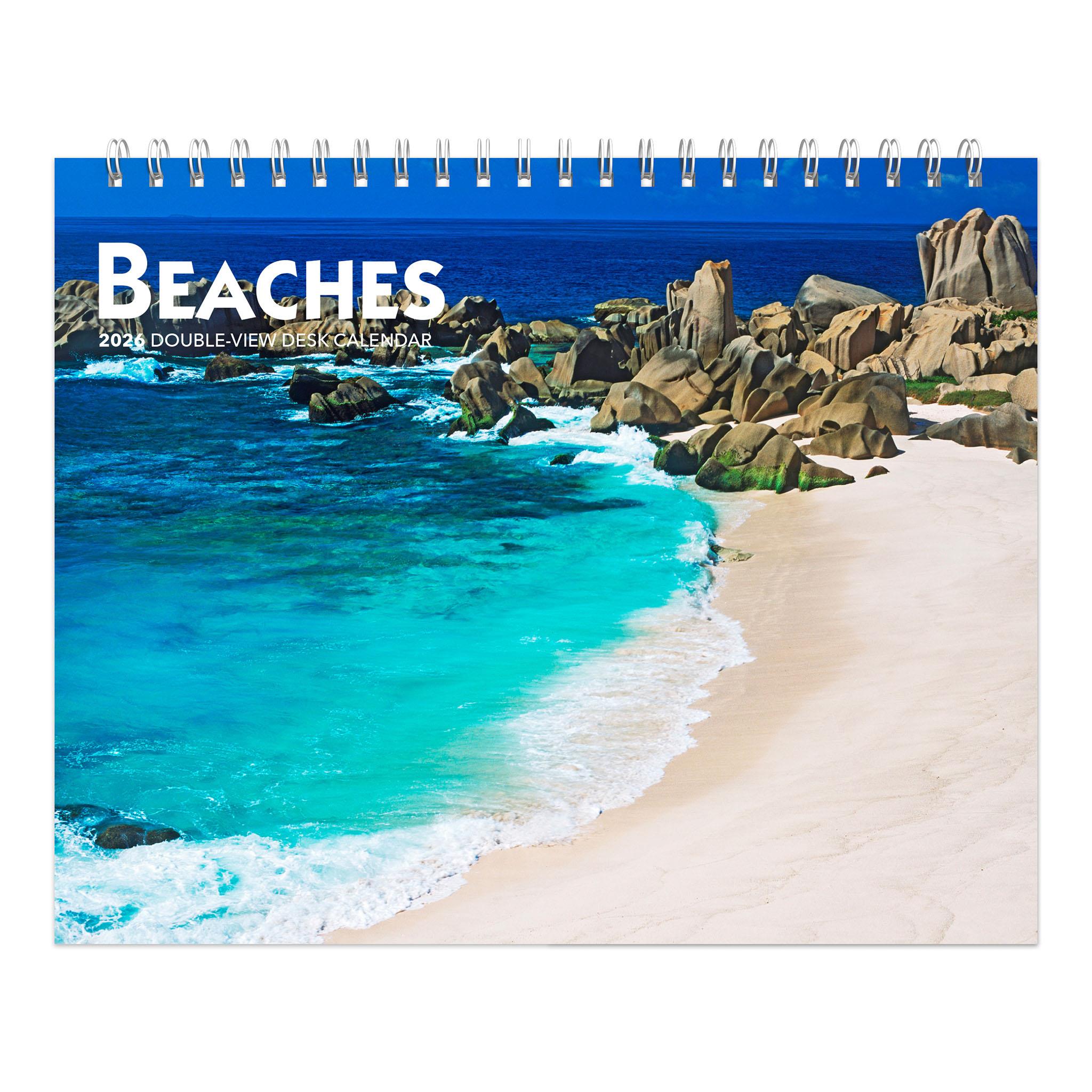 A calendar page for 2026 showing a beautiful beach scene with blue ocean and rocks.
