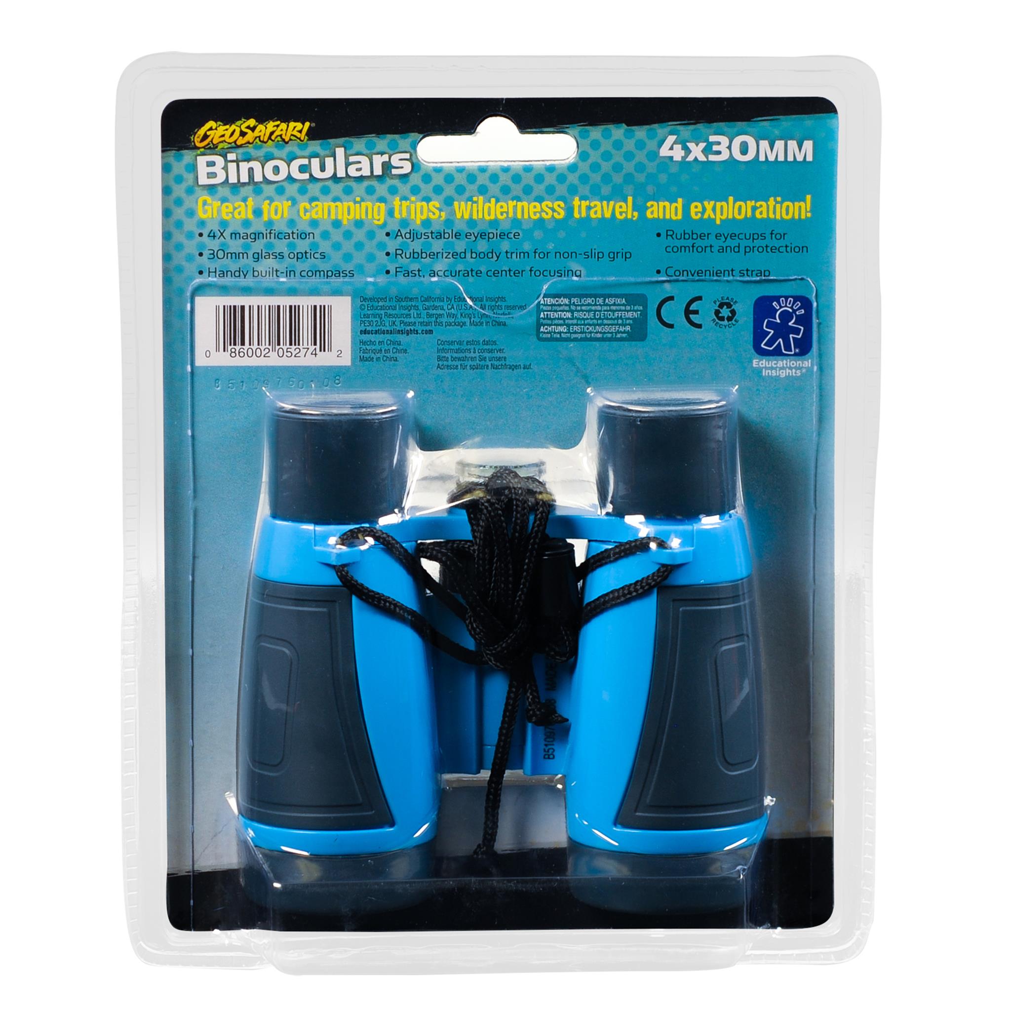 A pair of blue and black GeoSafari binoculars with a built-in compass, packaged in a clear plastic container with a cardboard backing.
