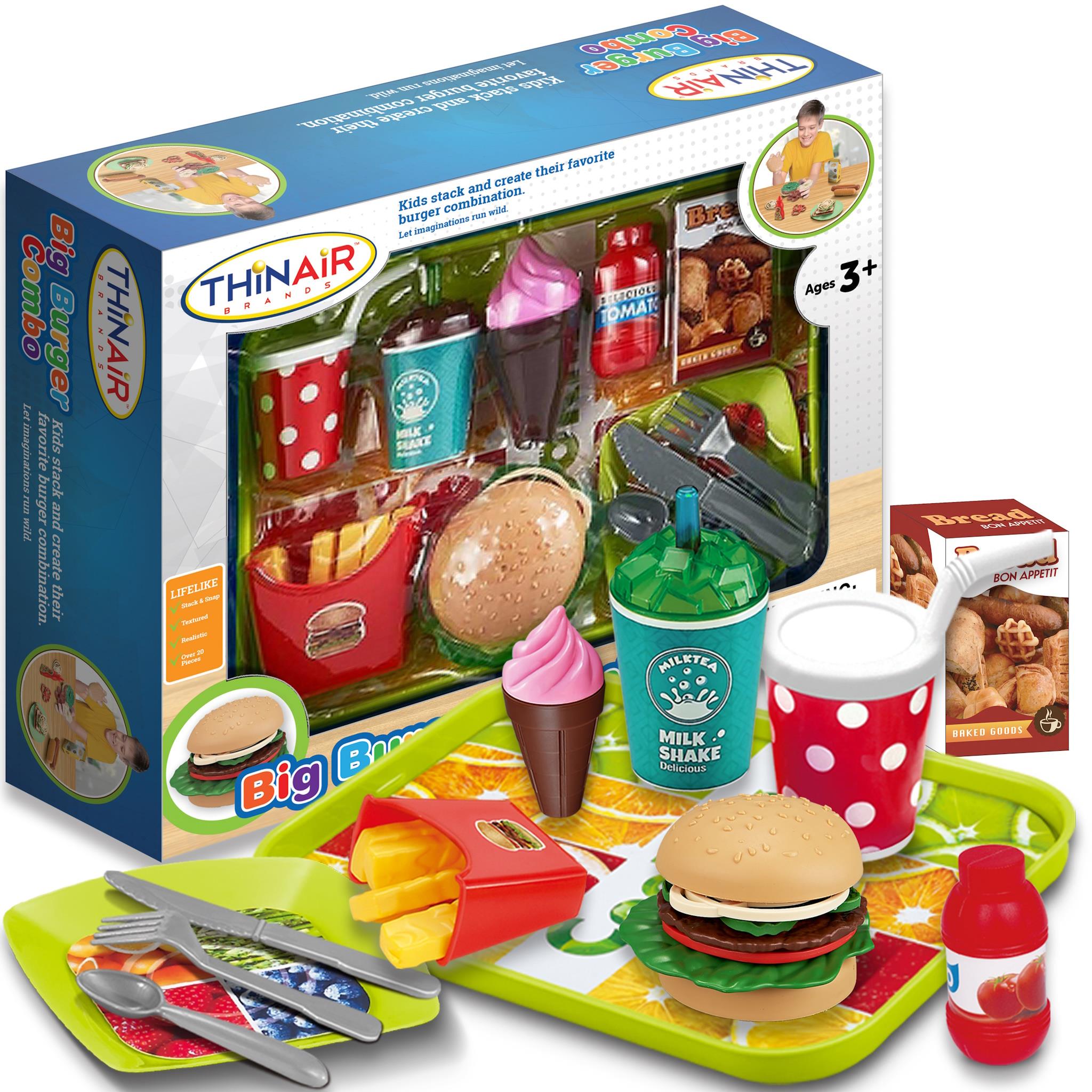 A colorful toy burger set including a serving tray, burger components, condiments, and a box packaging with images of the set in use.