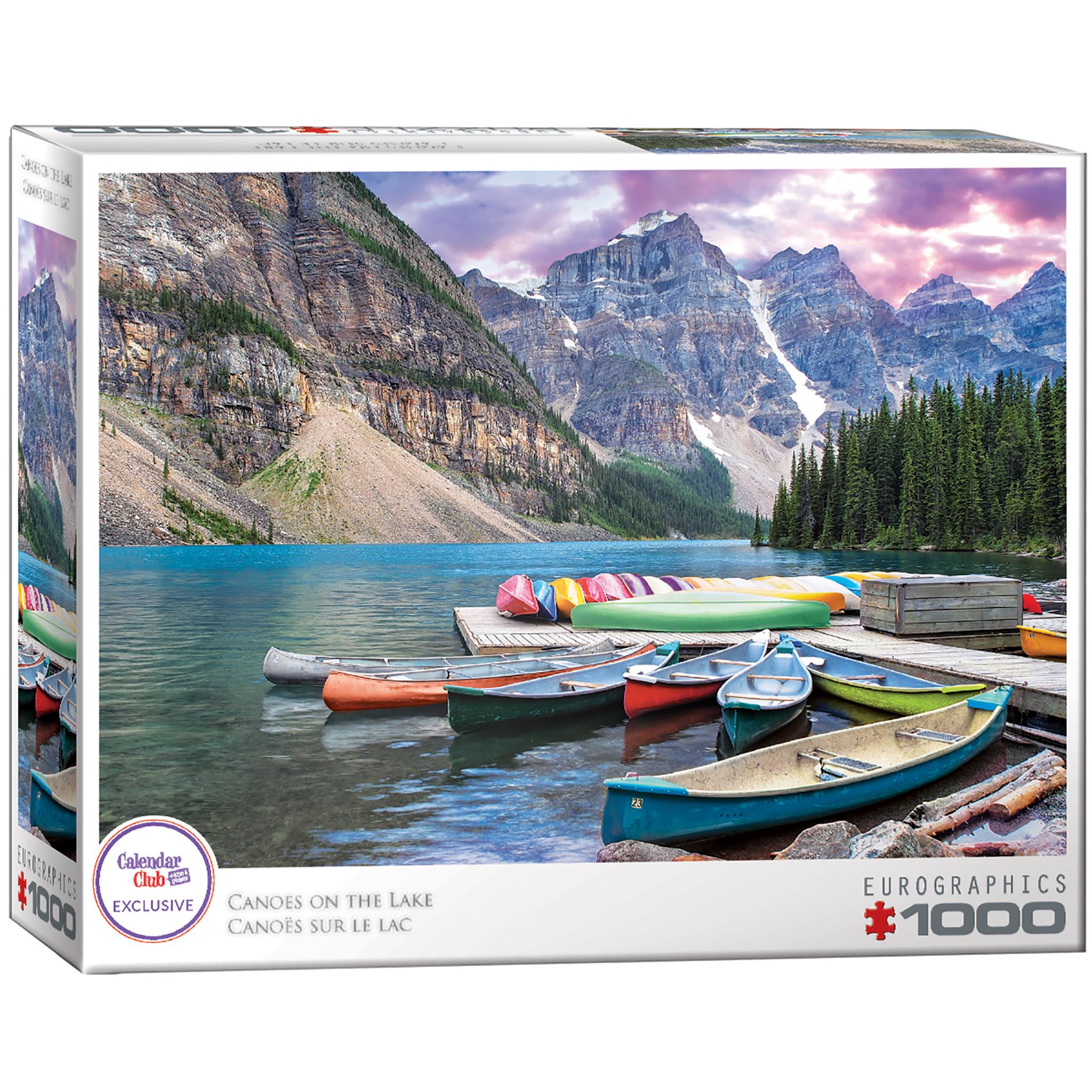 A 1000-piece jigsaw puzzle box featuring a vibrant image of canoes on a lake with mountains in the background.