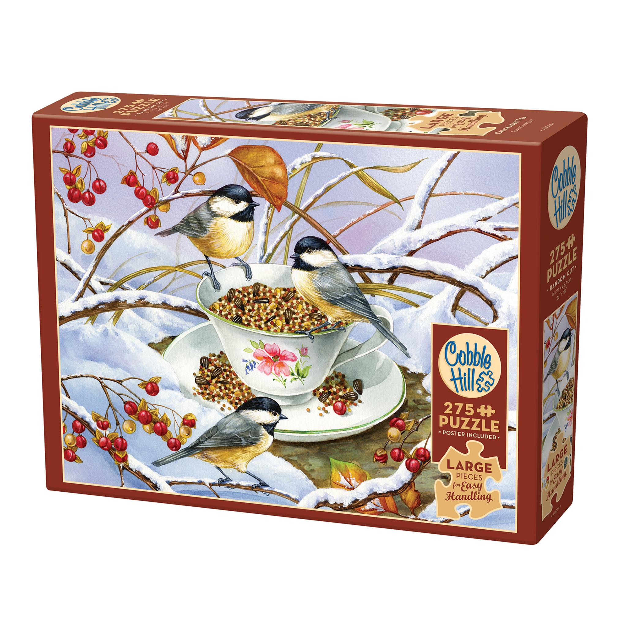 A puzzle box featuring an artistic depiction of chickadees perched around a tea cup filled with bird seed, set against a wintry backdrop with snow and berries.