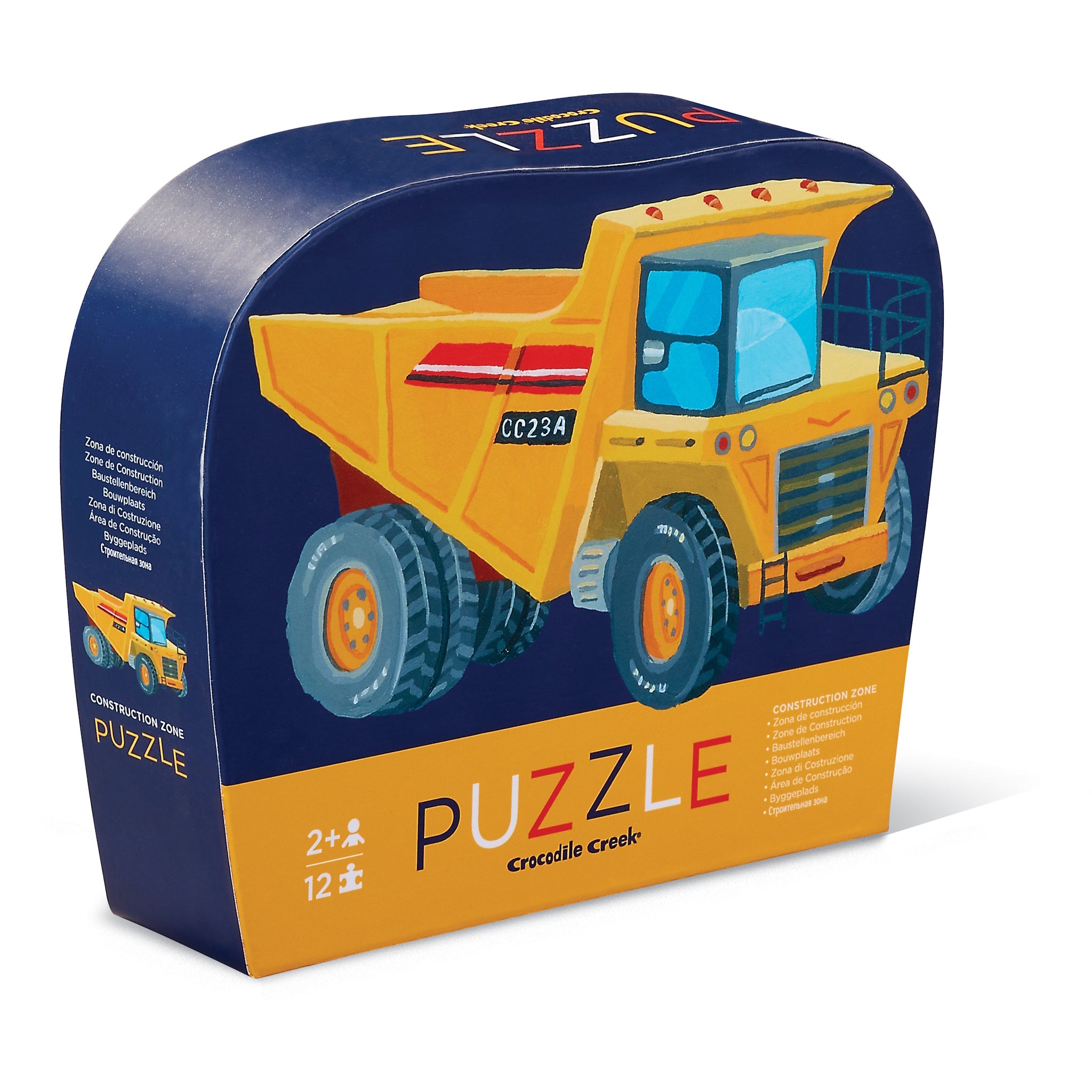 A packaged children's puzzle featuring a vibrant image of a construction vehicle on the box cover, with the brand 'Crocodile Creek' visible.