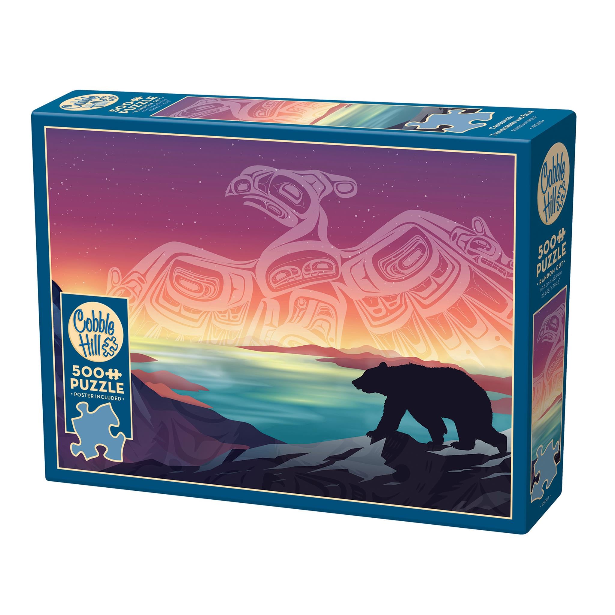 A 500 piece Cobble Hill puzzle box featuring a First Nations artist's painting with a silhouette of a bear and a bird in the sky over a body of water, with a colorful sunset or sunrise background.