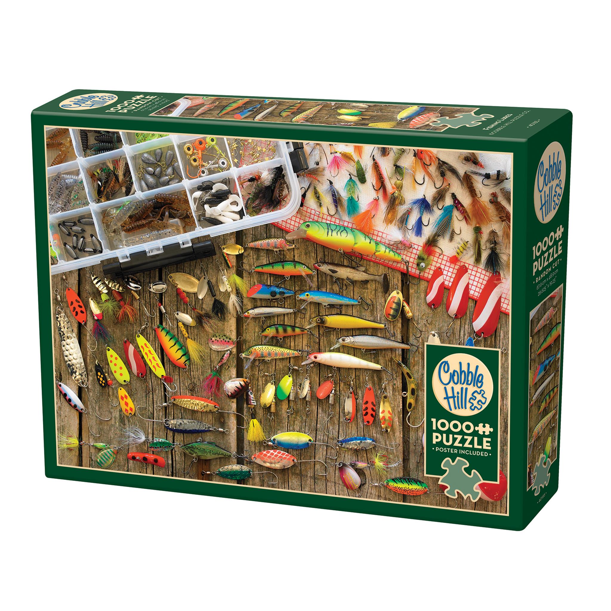 A 1000 piece Cobble Hill jigsaw puzzle box featuring various fishing lures displayed on a wooden surface.