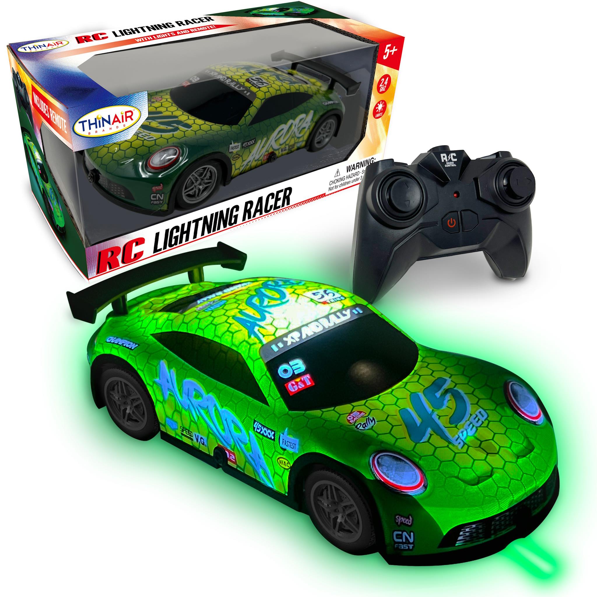 A green remote control racing car with blue and black accents, accompanied by a black remote control, against a white background.