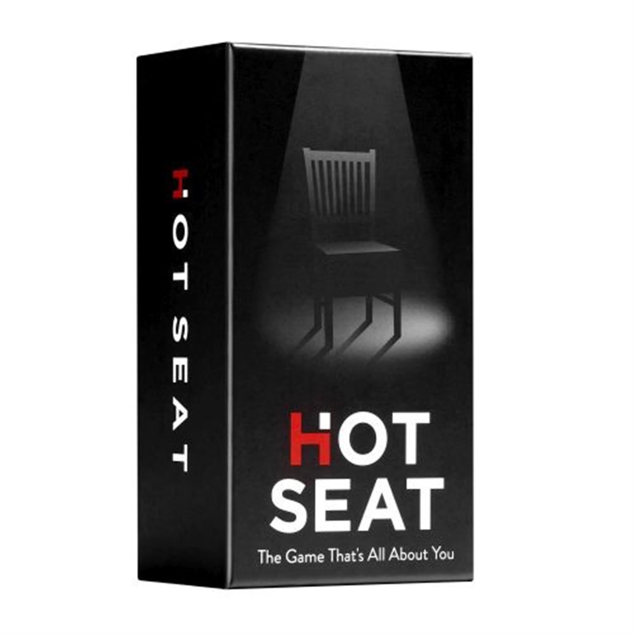 Board game box cover for 'Hot Seat', featuring a dark background with a chair in the center and the title text around it.