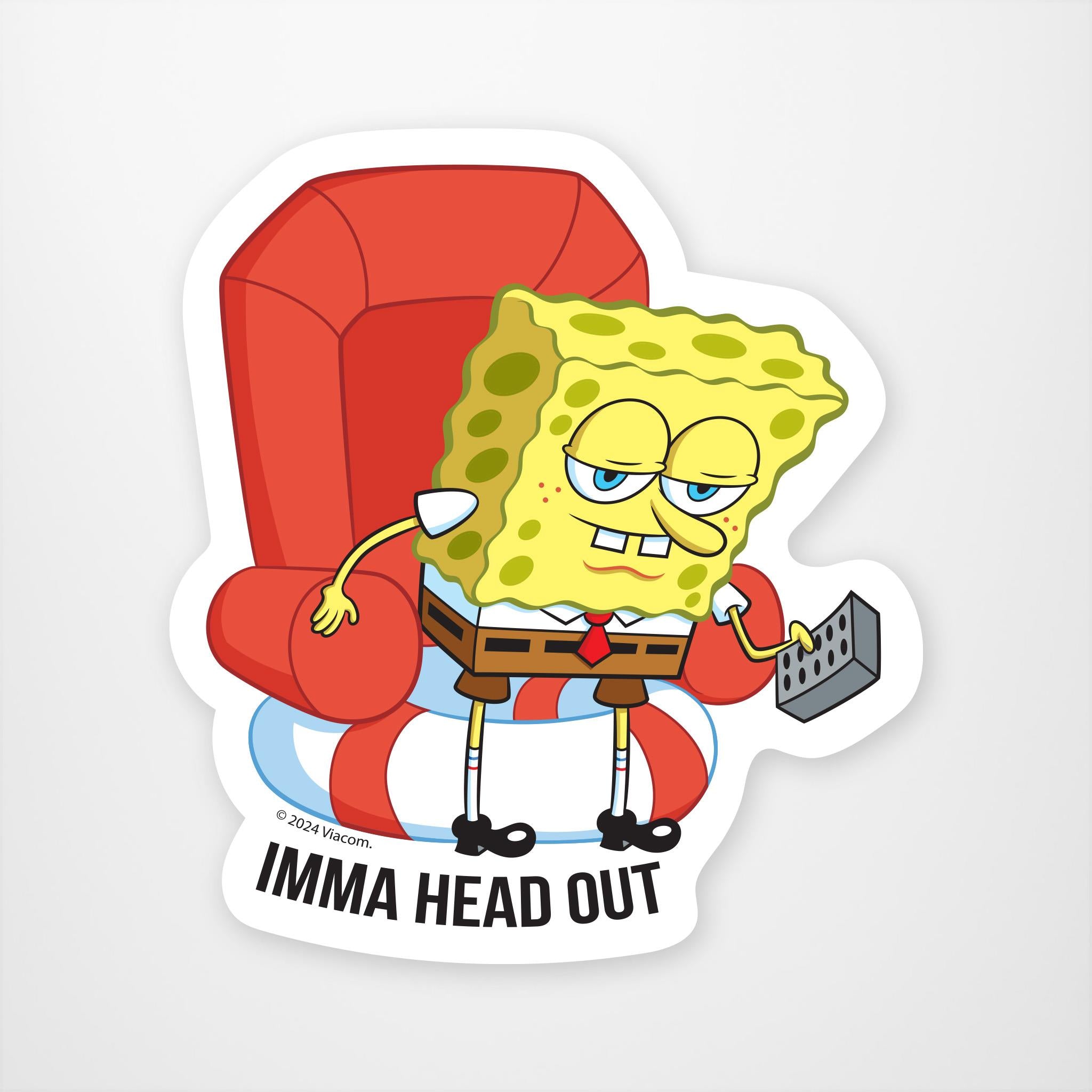A vinyl sticker featuring an animated character resembling a yellow sponge with eyes and a expression of frustration, sitting in a red armchair and holding a remote control, with the text 'IMMA HEAD OUT' below.