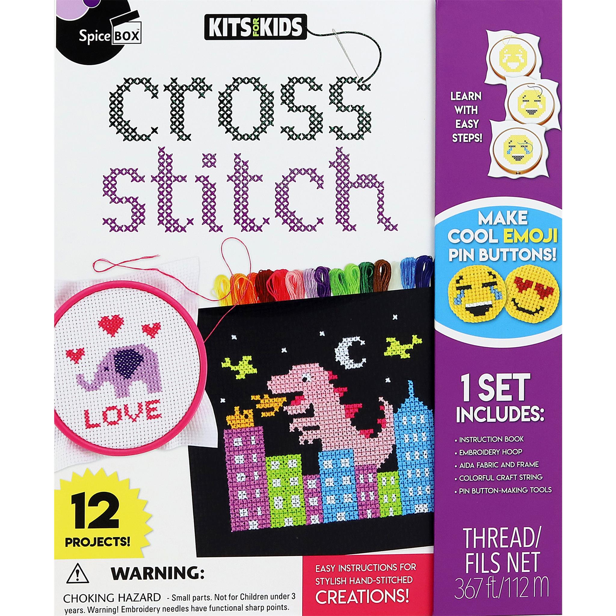 Packaging for 'Kits for Kids Cross Stitch' featuring the kit contents such as black and white aida fabric, embroidery needles and hoop, button making tools, and colorful threads, along with a completed cross stitch love design.