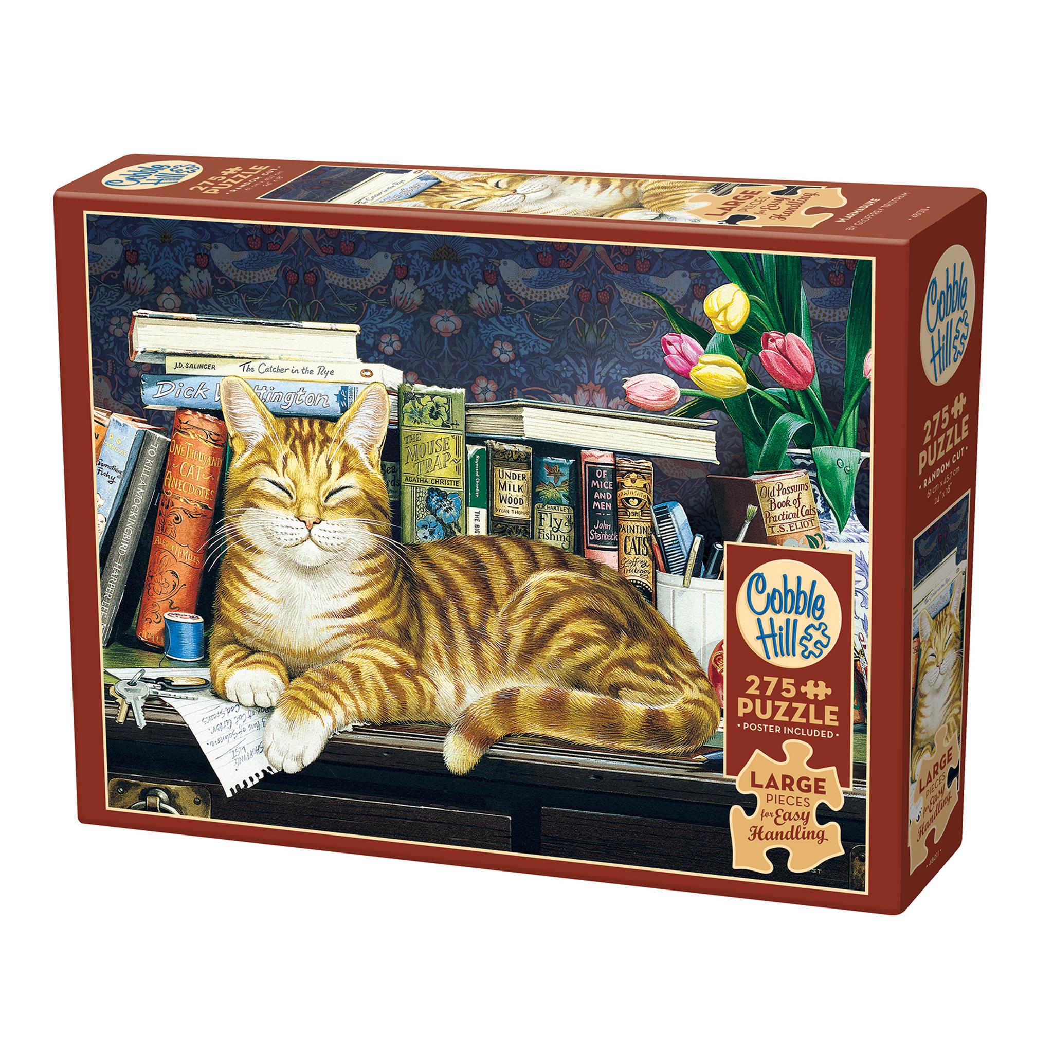 A puzzle box featuring an illustration of a cat lying on a surface with books and a vase of tulips in the background.