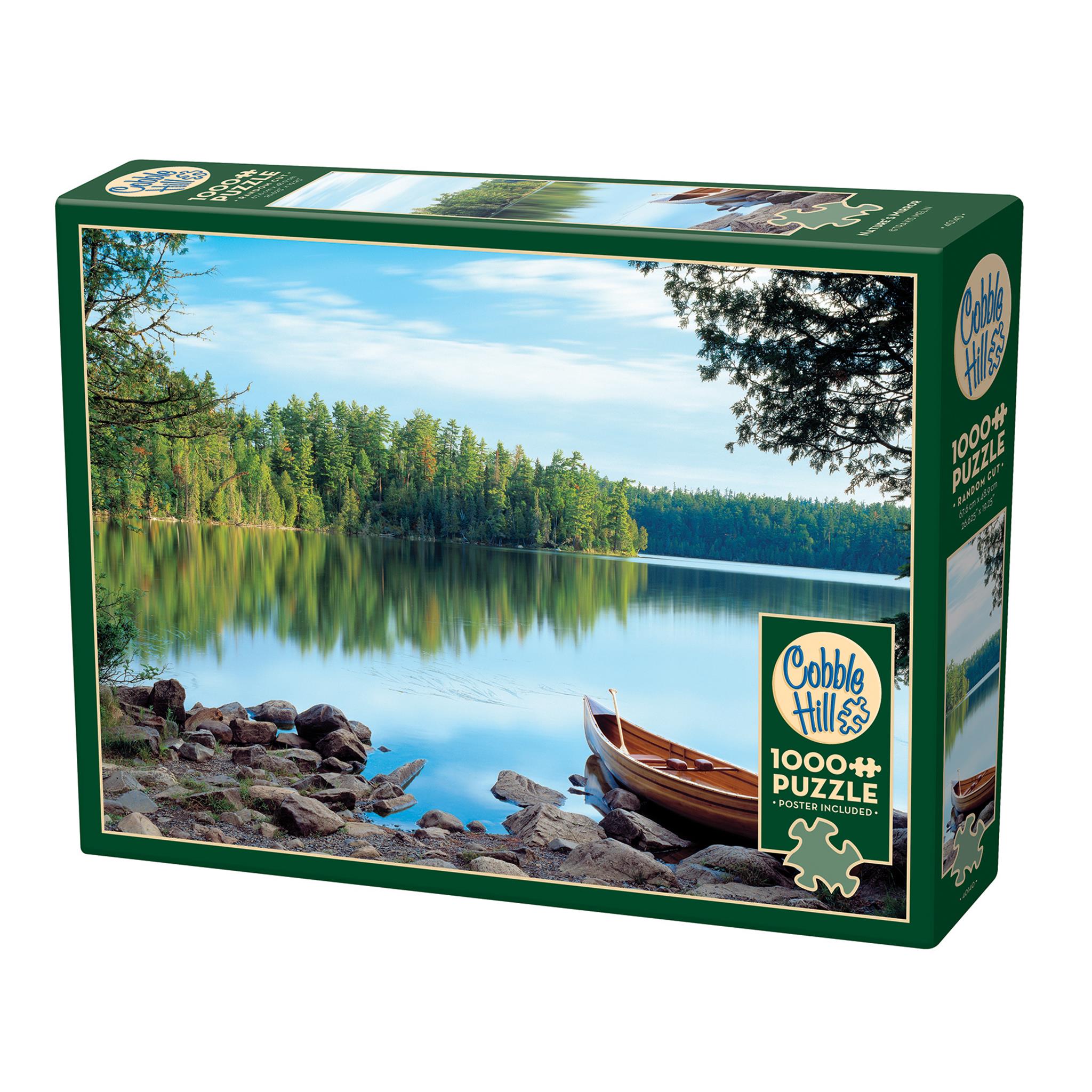 A 1000 piece Cobble Hill puzzle box featuring an image of a quiet lake with trees on the shore and a small boat.