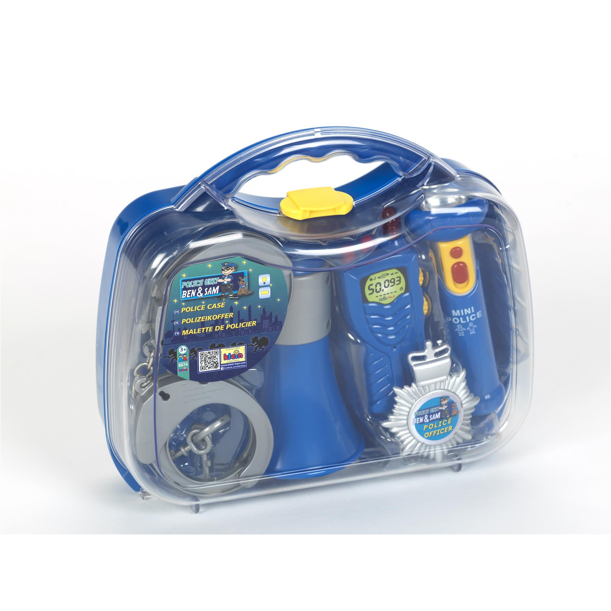 A plastic police case toy set containing a walkie-talkie, megaphone, handcuffs, and a police badge, packaged in a clear plastic container.