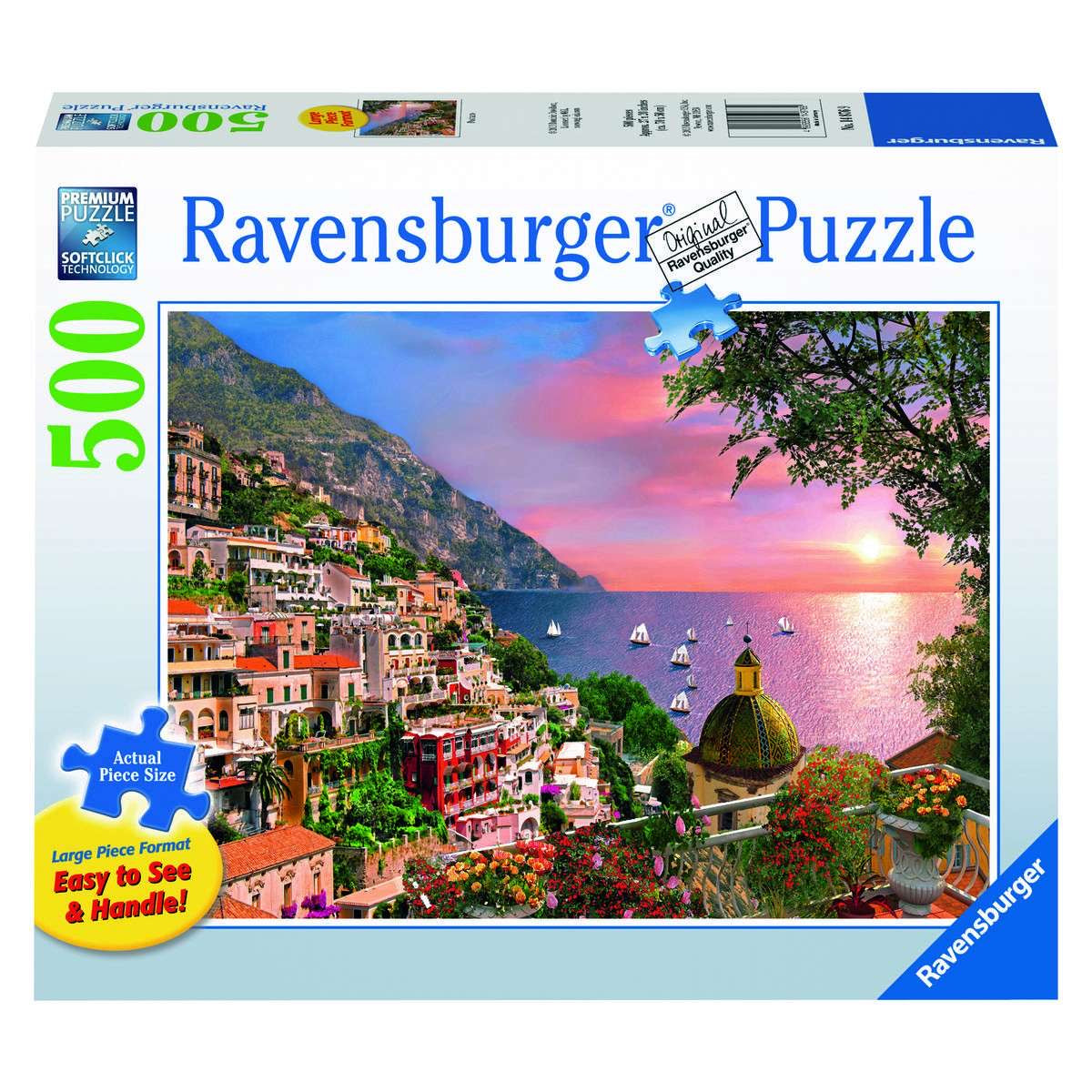 A 500 piece Ravensburger jigsaw puzzle depicting a colorful scene of a cliffside village on a Mediterranean coast at sunset.