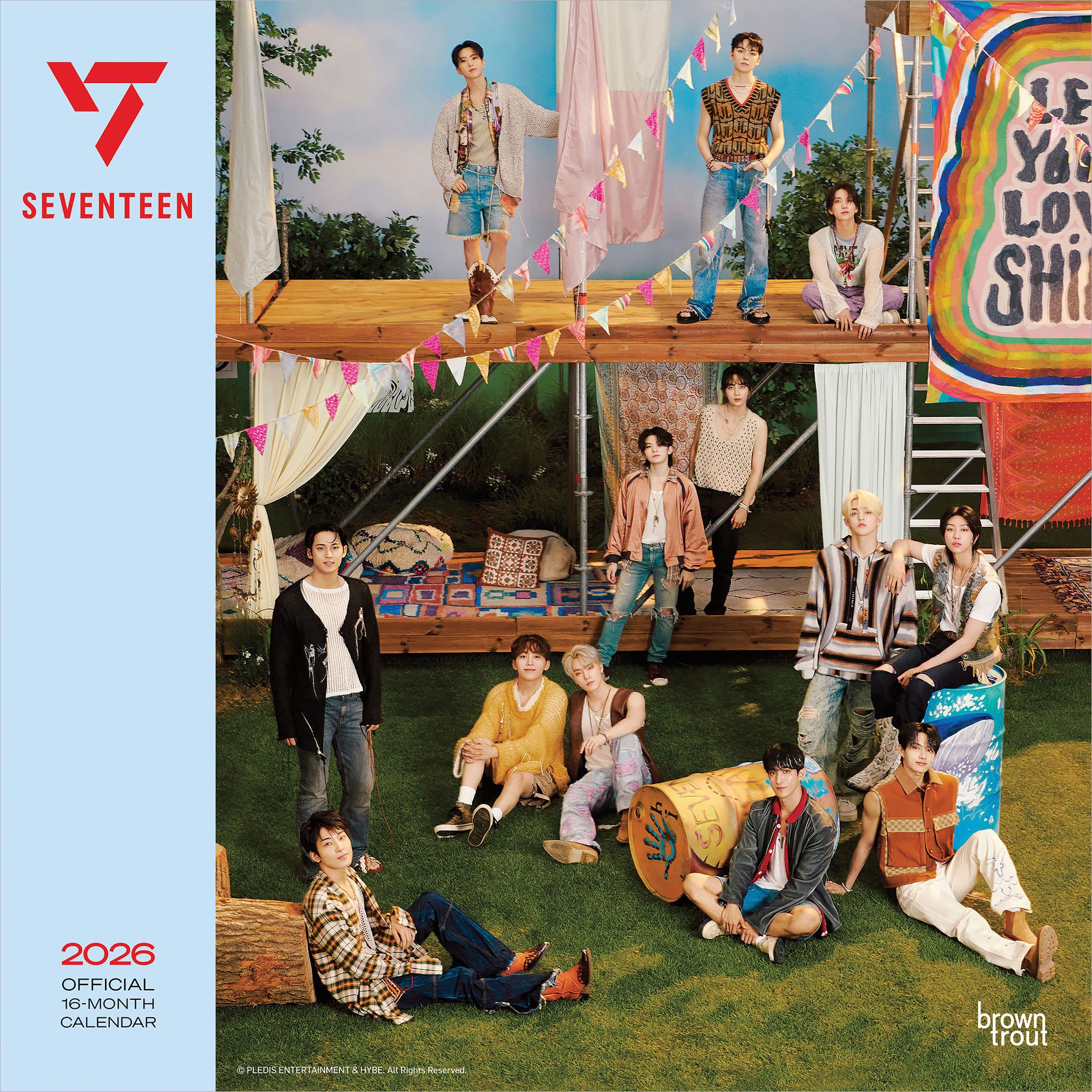 A group of K-pop band Seventeen posing for a calendar, featuring members in casual attire, sitting and standing on a stage with colorful backdrops and decorations.