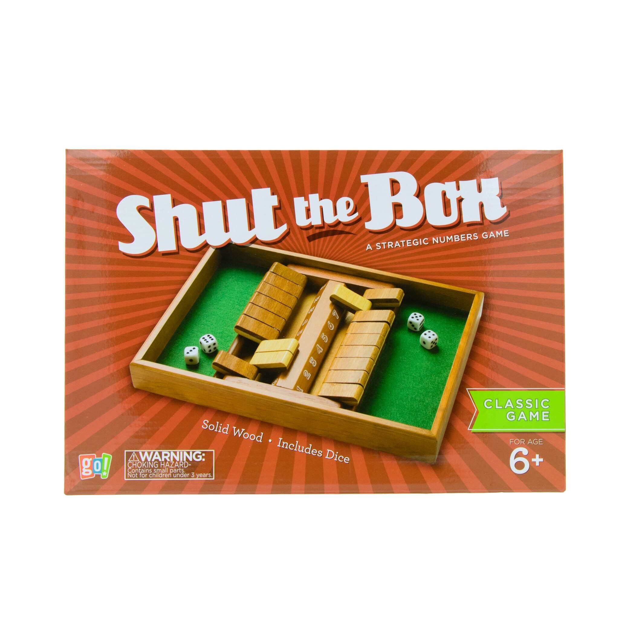 A Shut the Box game set with a wooden board, dice, and a green felt surface, packaged in a box with the game's name and age recommendation visible.