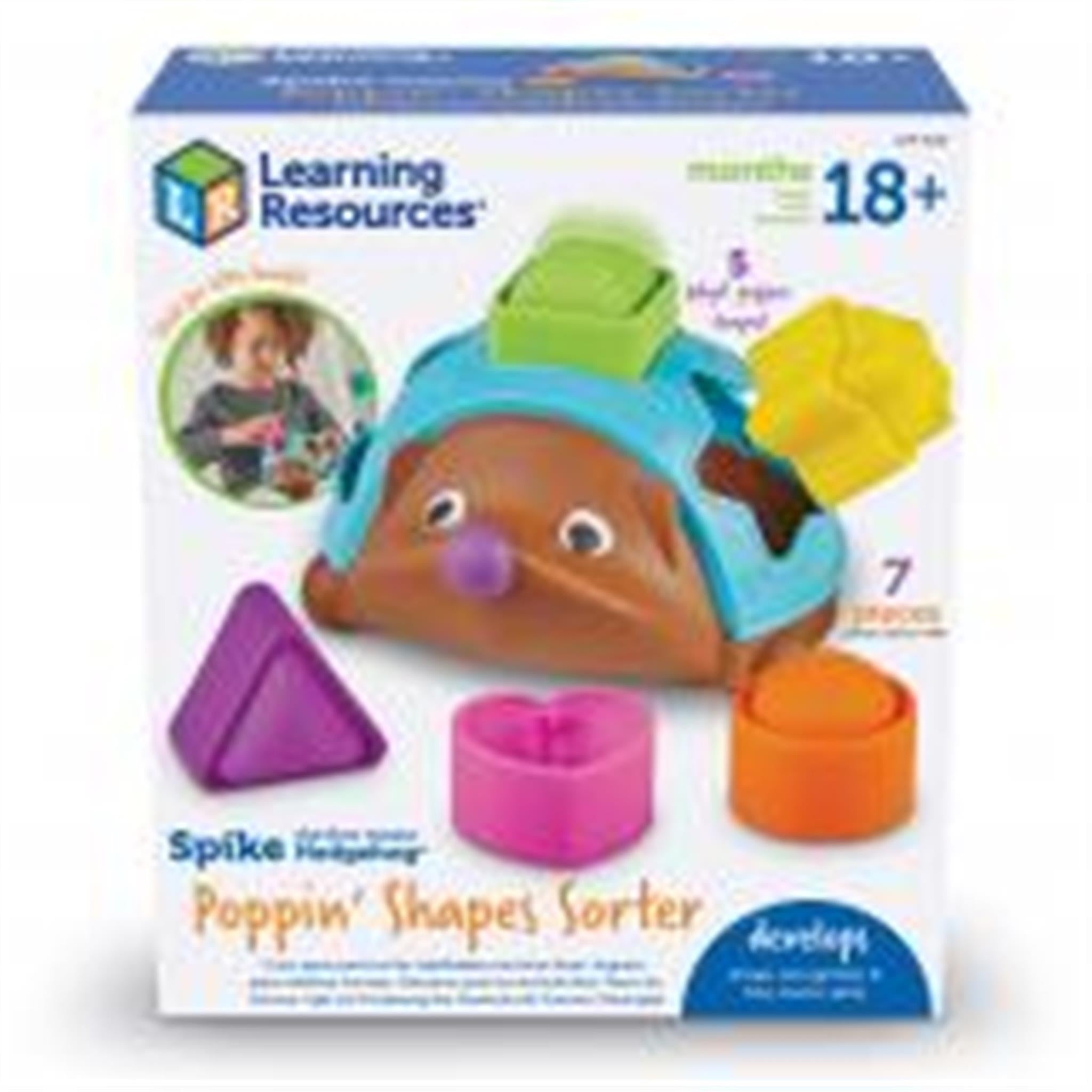 Packaging for Spike the Fine Motor Hedgehog Poppin' Shapes Sorter, featuring a cartoon hedgehog in a blue hat with a selection of colorful geometric shape pieces, such as a triangle, heart, and circle.
