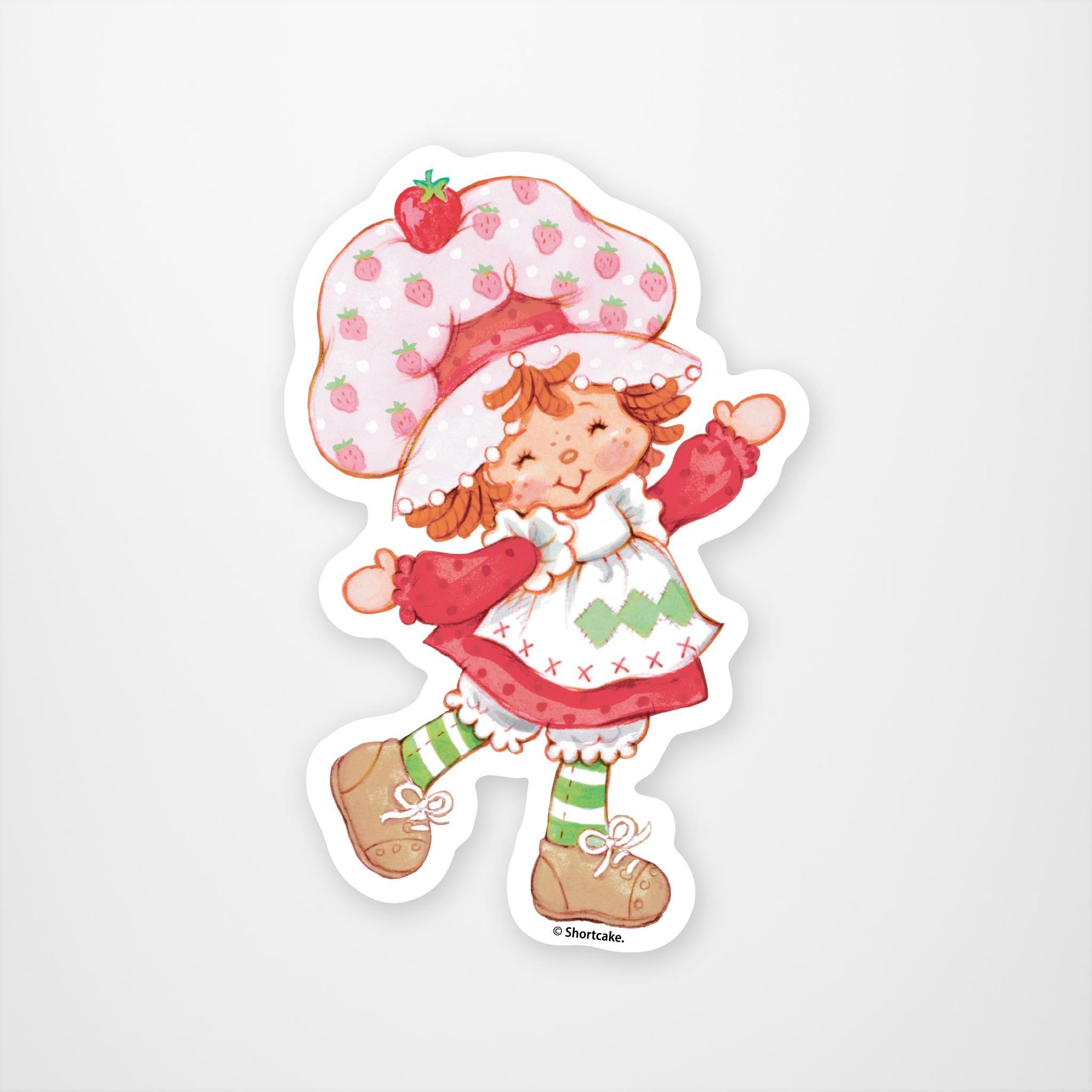 classic styled strawberry shortcake with puff hat and arms outstretched