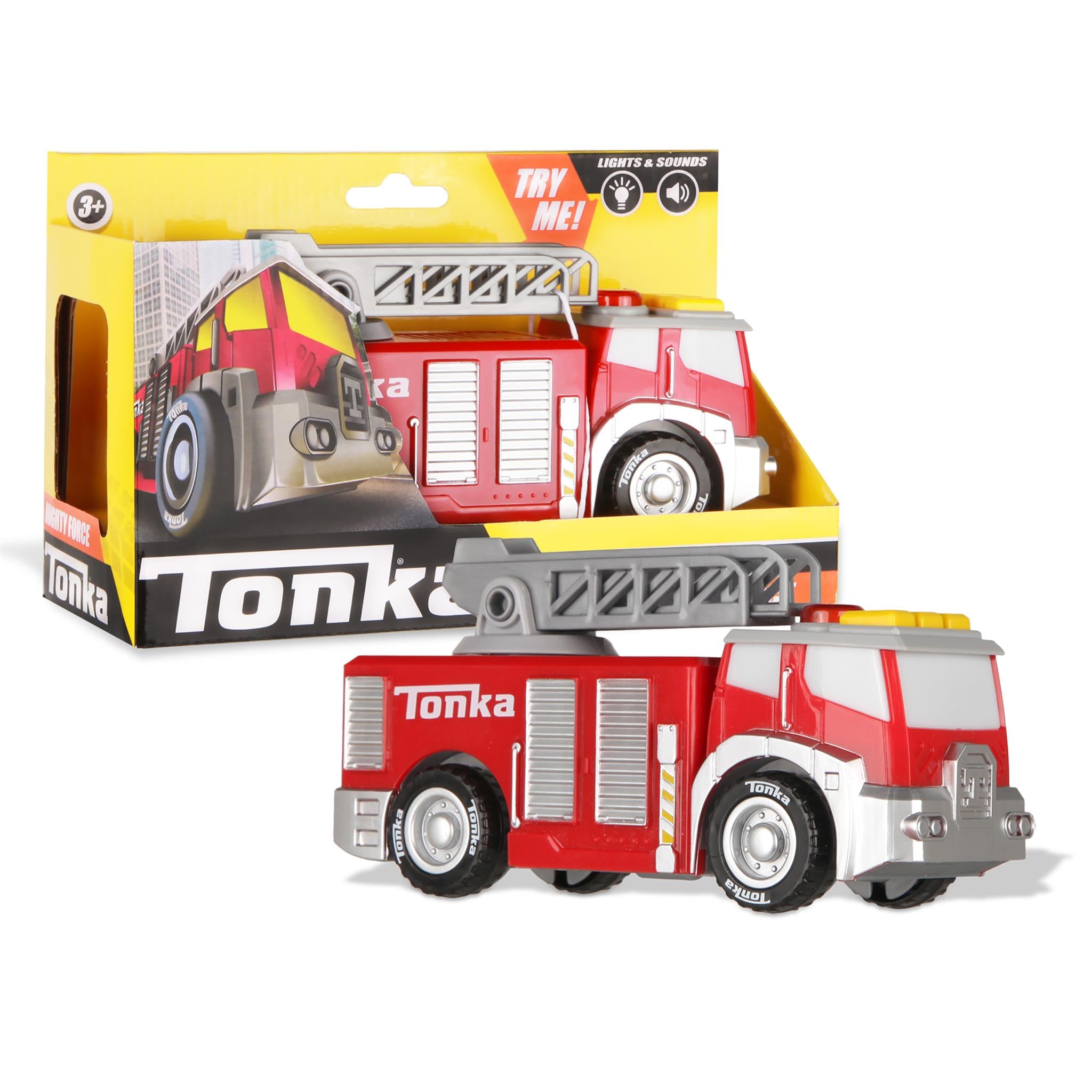 Packaged Tonka Mighty Force toy vehicle, in this case a fire truck, with red and silver color scheme. The toy is shown both in its box and out of the box.