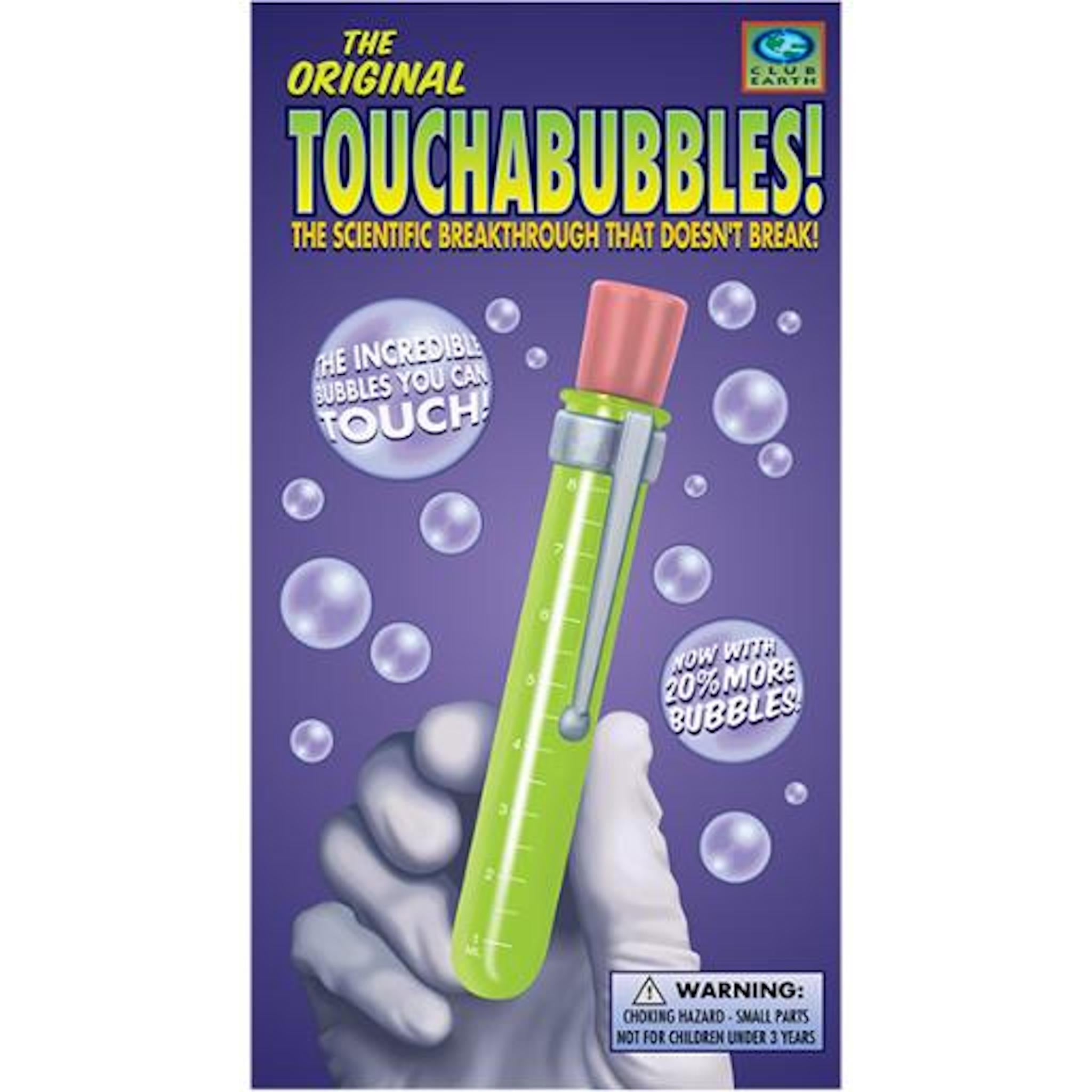 The image shows the packaging of Touchabubbles, featuring the product name, a brief description, and the age suitability. The product itself appears as a green bubble solution dispenser with a pink bubble solution, shown in use with a hand generating bubbles.