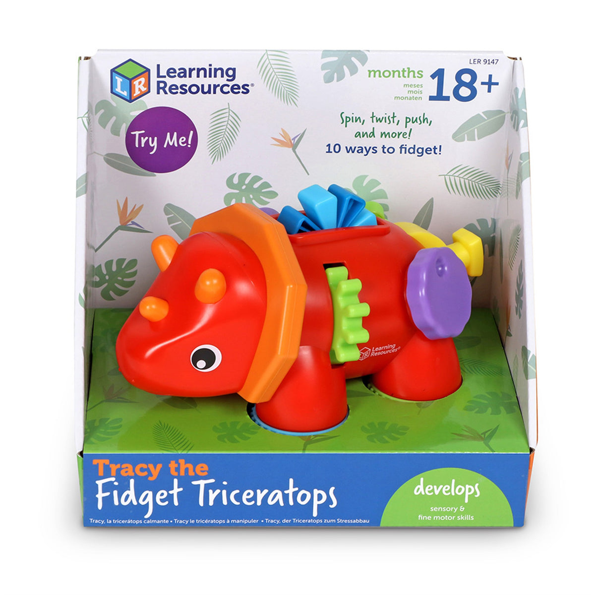 Packaged 'Tracy the Fidget Triceratops' toy featuring a colorful dinosaur with a wheel and lever on its back, displayed in its retail box.