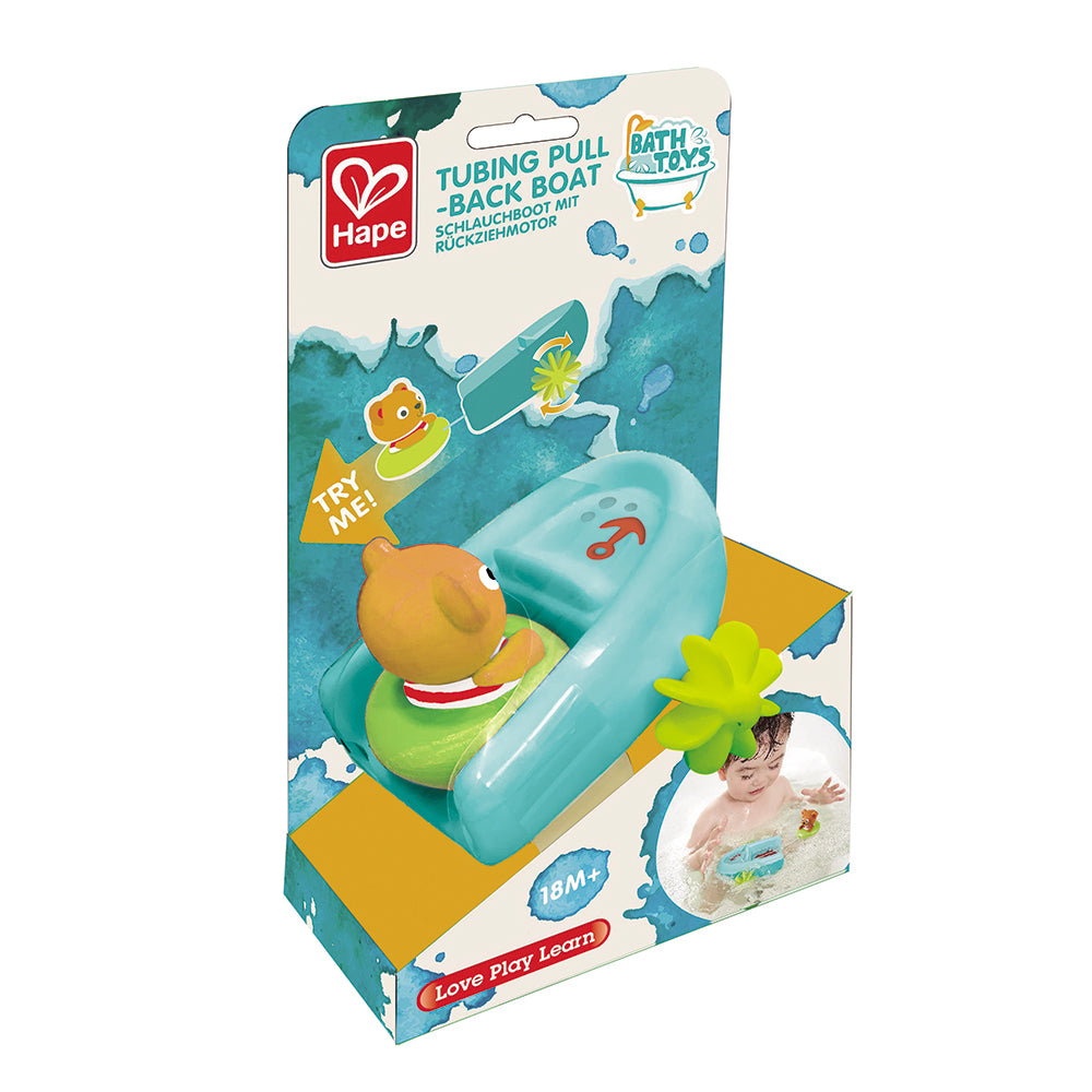 Packaged tubing pull-back boat toy featuring a green and blue boat with a yellow teddy bear in a box, labeled for bath time fun.