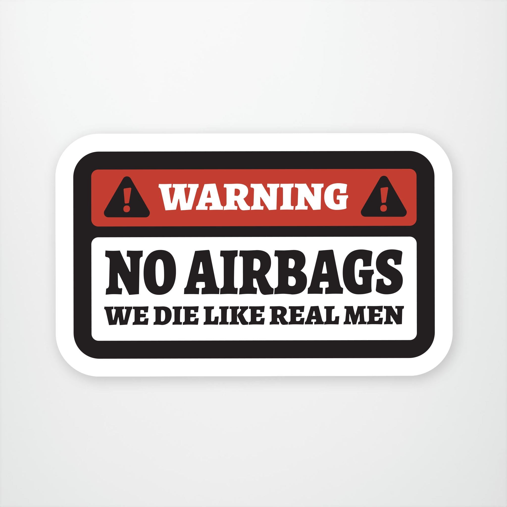 White sticker with red sections that reads warning. Below black text on a white background reads NO AIRBAGS WE DIE LIKE REAL MEN in caps