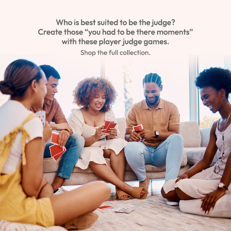 Group of people playing card games together in a casual setting.