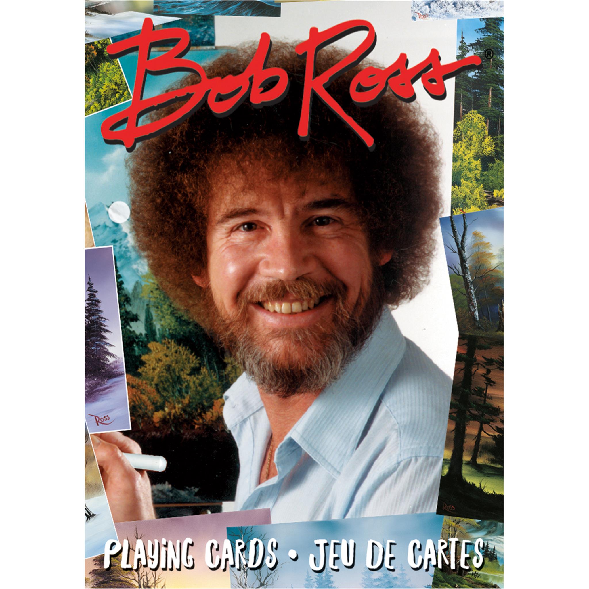 A pack of Bob Ross Playing Cards featuring an image of the late Bob Ross with a background of some of his paintings.