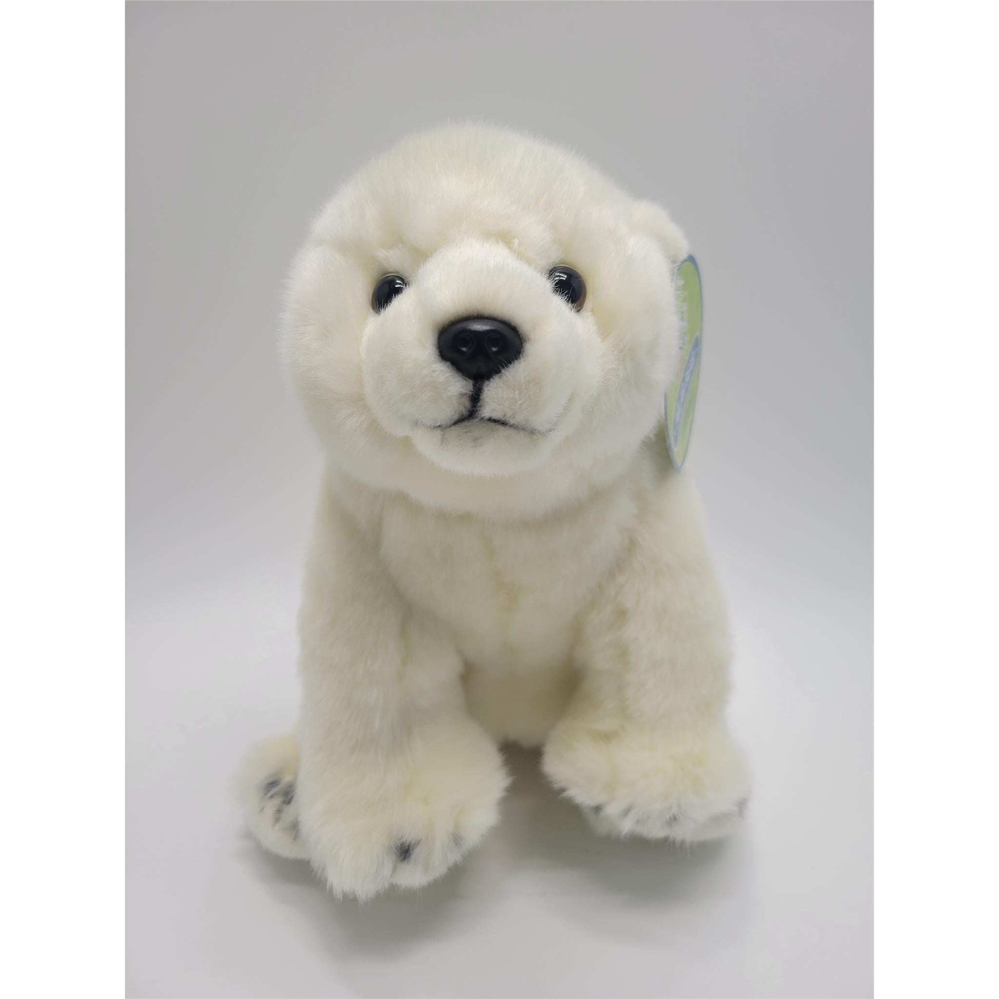 White plush Polar Bear pup with shiny plastic nose and eyes. Black markings on feet.