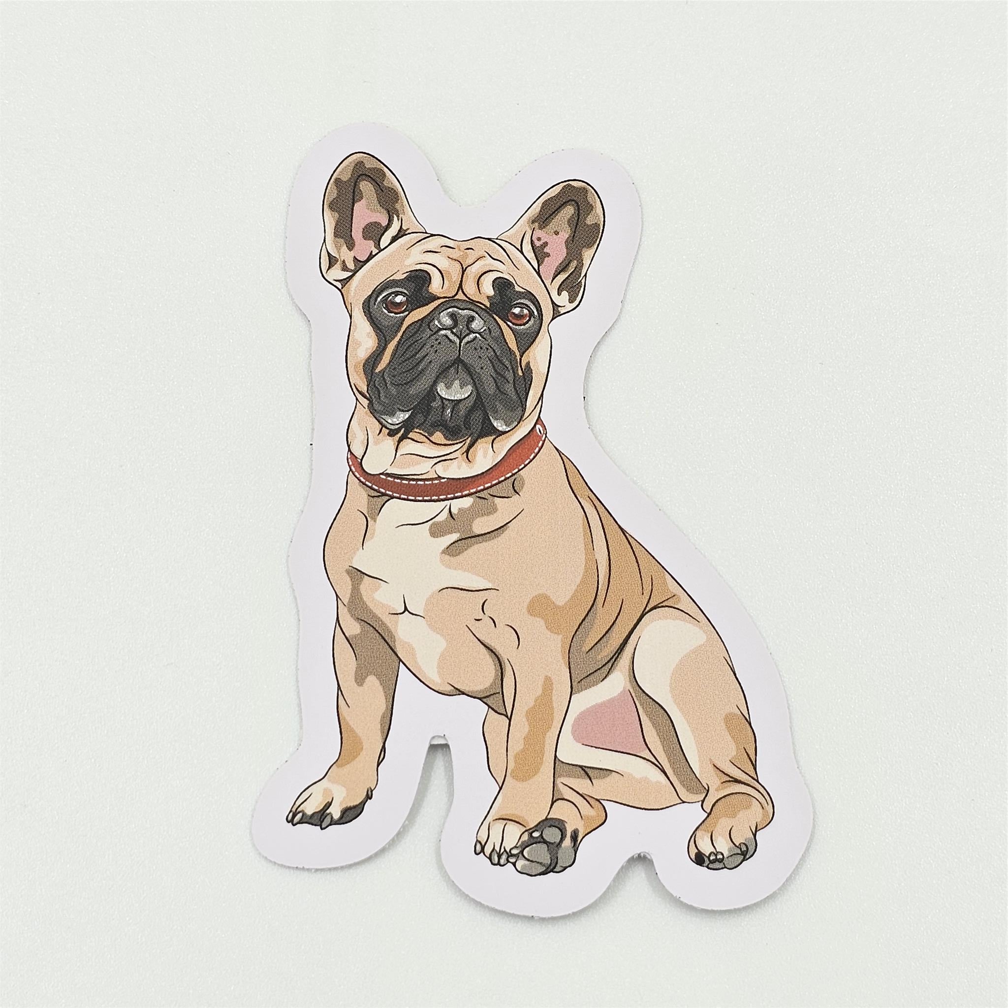 A vinyl sticker depicting a beige French Bulldog sitting with a red collar.