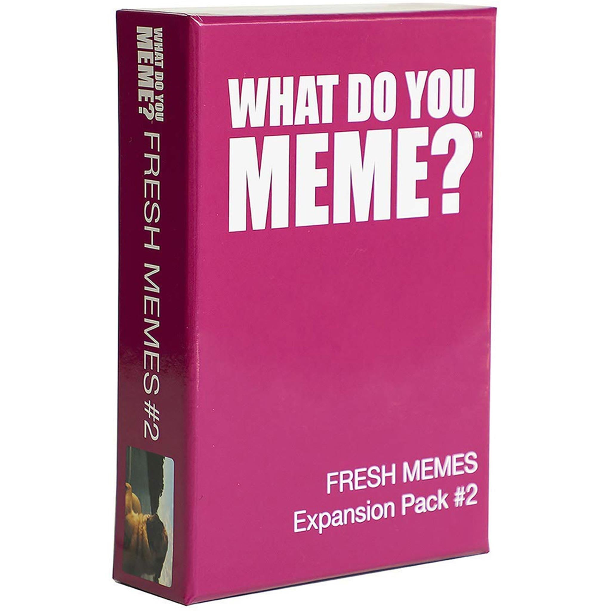 The image shows the packaging of 'Fresh Memes 2 Expansion Pack' for the game 'What Do You Meme?'. The box is predominantly pink with white and black text and design elements.