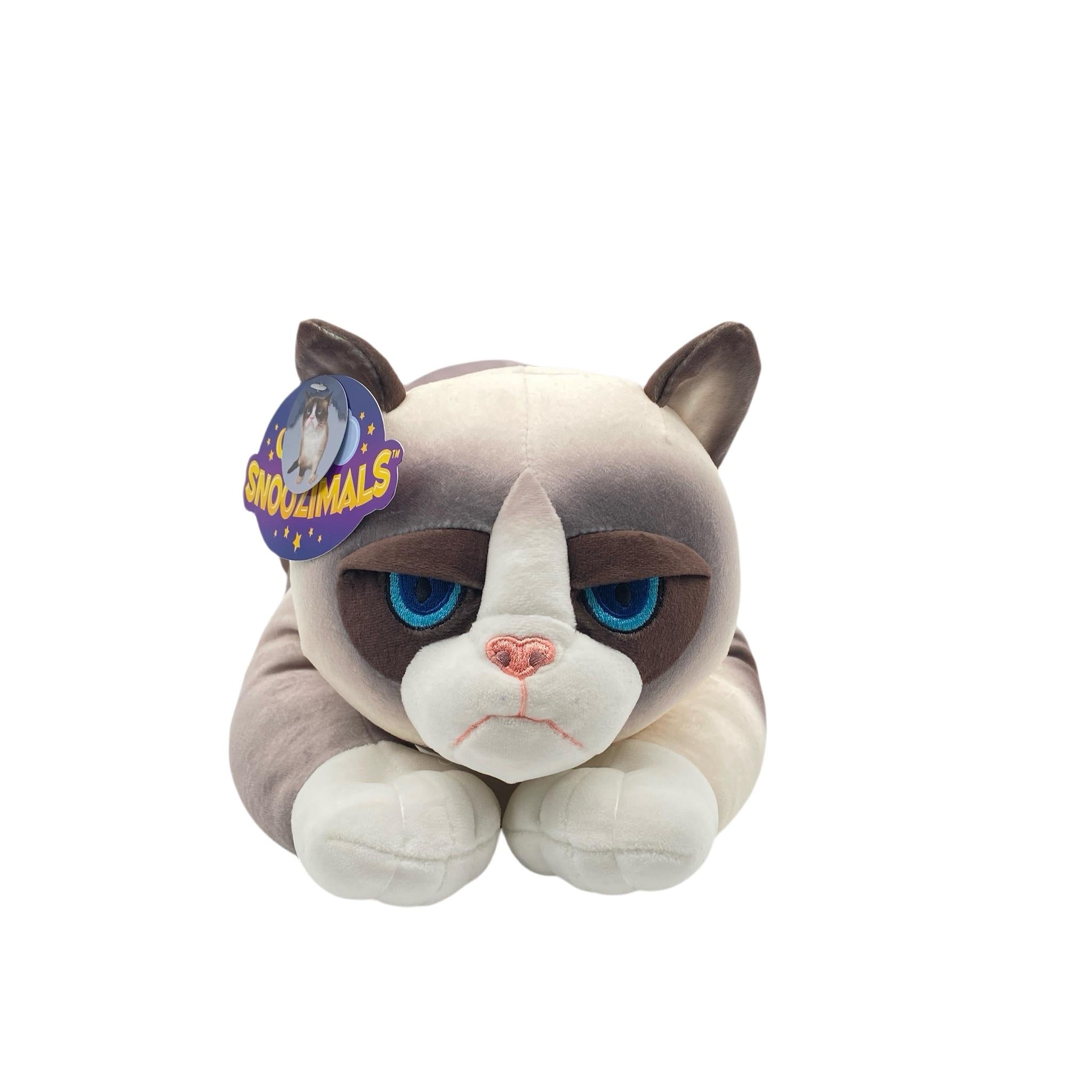 A plush toy resembling a grumpy cat with a blue collar, featuring the 'Snoozimals' brand tag.
