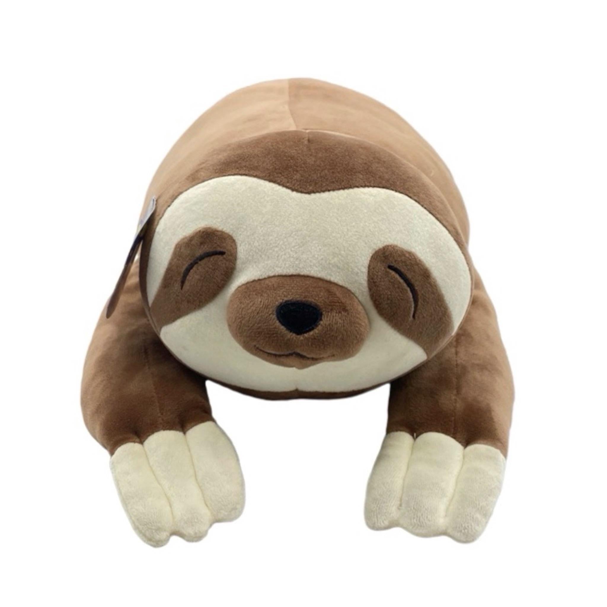 A plush toy resembling a brown and beige sloth with a peaceful facial expression.
