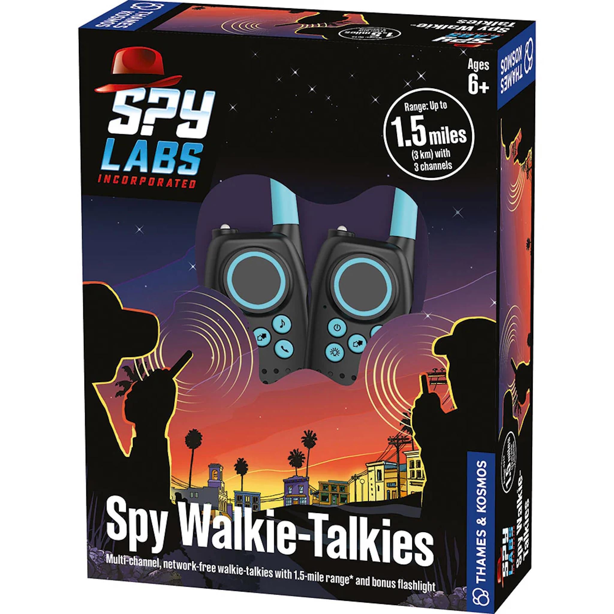 Box packaging for Spy Labs Walkie-Talkies featuring the product with a night cityscape background, indicating a range of 1.5 miles and flashlight function.