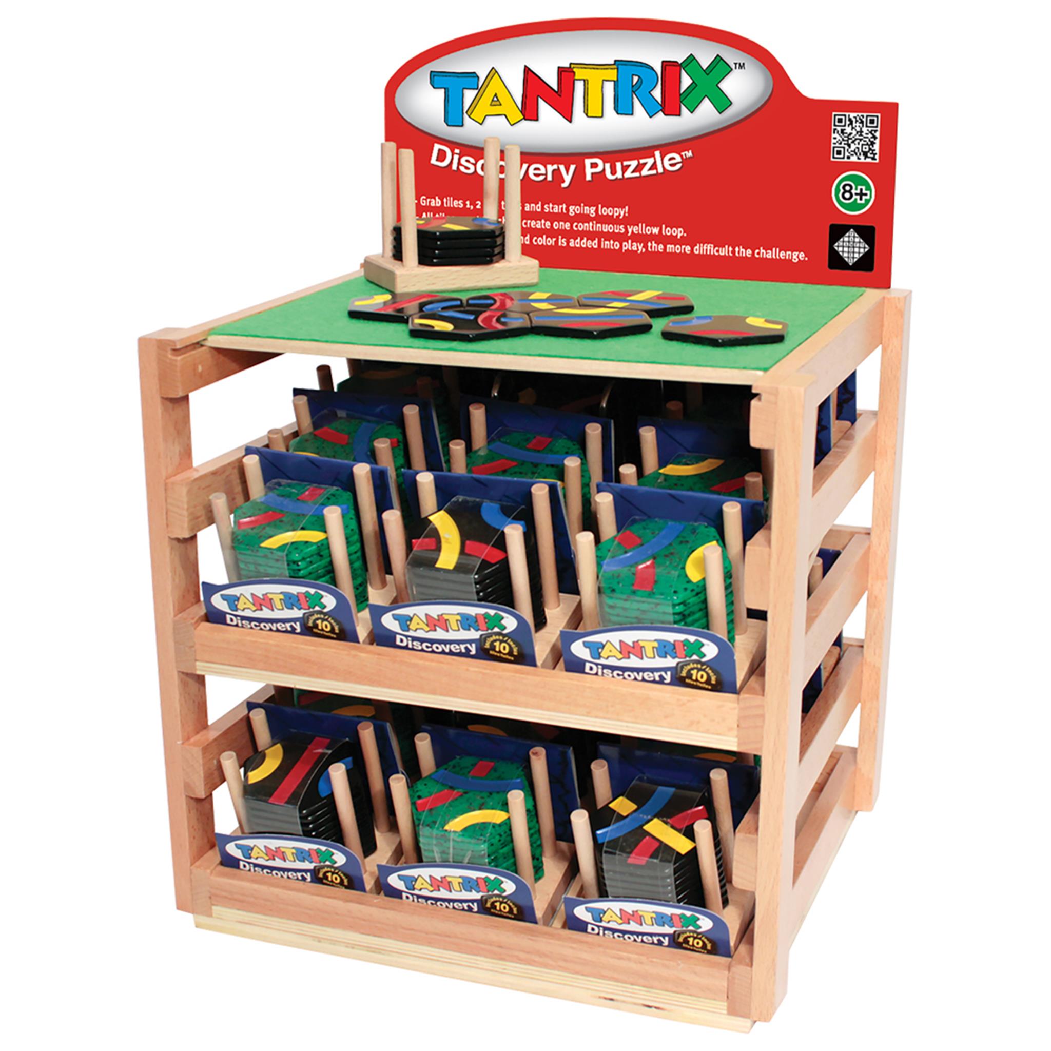 A Tantrix Discovery Wood puzzle game set displayed on a stand with multiple shelves, featuring hexagon shaped tiles with colors and numbers. Sold Individually